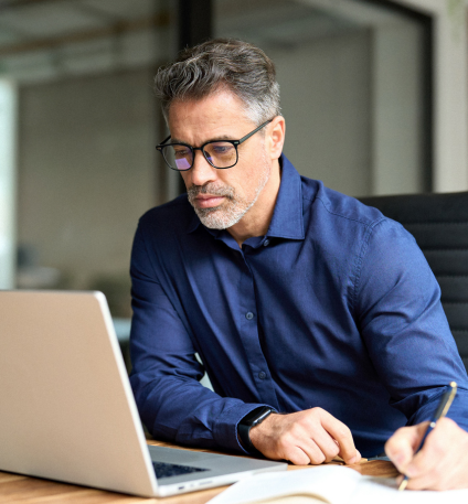man looking at laptop